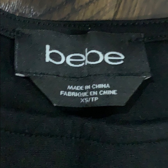 Beautiful peplum top from Bebe - Picture 2 of 3